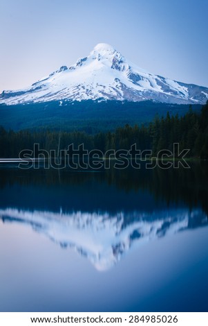 Mount Hood reflecting in Trillium Lake at twilight, in Mount Hood National Forest, Oregon.