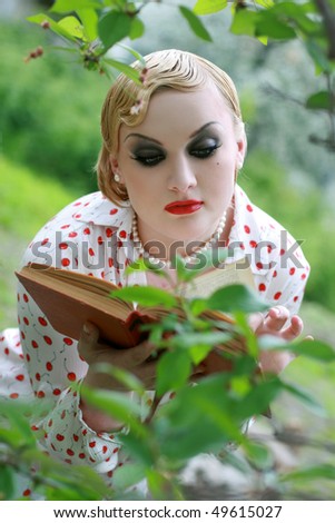 attractive girl in garden the fresh air reading book