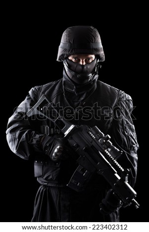 Spec ops soldier on black background