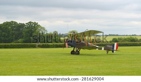 OLD WARDEN, BEDFORDSHIRE, ENGLAND - MAY 24, 2015: Royal Aircraft Factory B.E.2s landing on airfield.