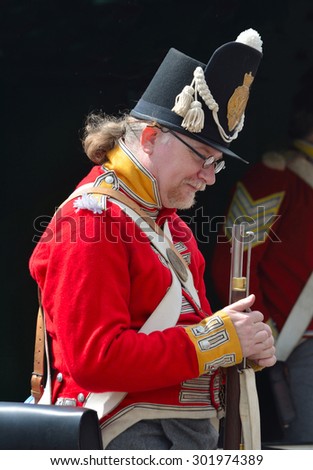 ST NEOTS, CAMBRIDGESHIRE, ENGLAND - JULY 25, 2015: Infantry man in Napoleonic uniform of British Infantry of the line.