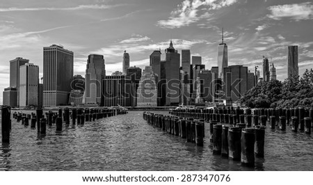 Black and White New York Financial District from Brooklyn Bridge Park with Old Pier