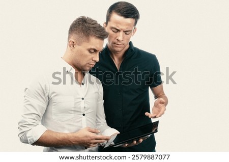 Similar – Image, Stock Photo Romantic Gay couple working together at home with their laptops.