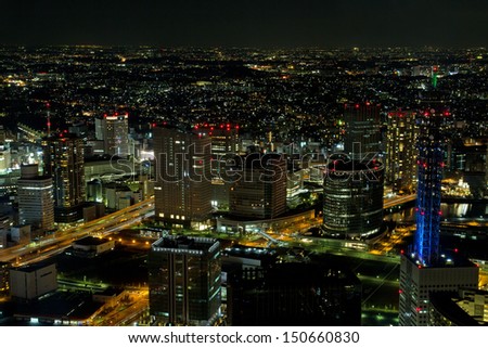 YOKOHAMA, JAPAN - FEB 18: View of Yokohama city at night in Japan on Feb 18, 2012. With 3.6 million inhabitants Yokohama is a major commercial hub of the Greater Tokyo Area.