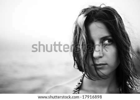 Woman with fluttering hair. bw portrait