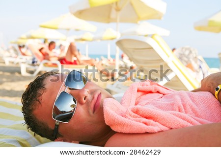man relax on the beach