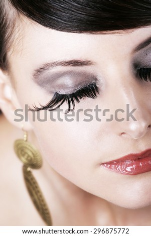 Close up Pretty Face with Elegant Makeup of a Thoughtful Young Woman with Eyes Closed