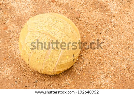 Old Volleyball - An old volley ball abandoned in a field.
