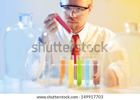 Man Picking Sample That Matches Color of His Tie