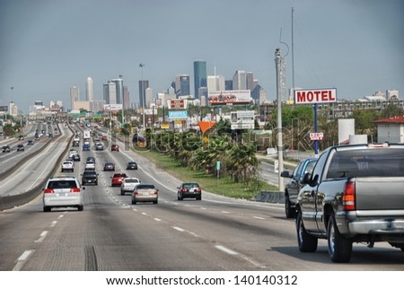 HOUSTON - MAR 15: Cars enter the city, March 15, 2009 in Houston. Traffic is a big city issue in the last years.