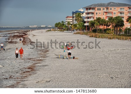FORT MYERS, FLORIDA - JAN 5: Tourists walk in city streets, January 5, 2009 in Fort Myers, Florida. Half a million people visit the city every year.