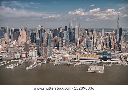 Helicopter view of Midtown West and Hudson river, Manhattan skyline.