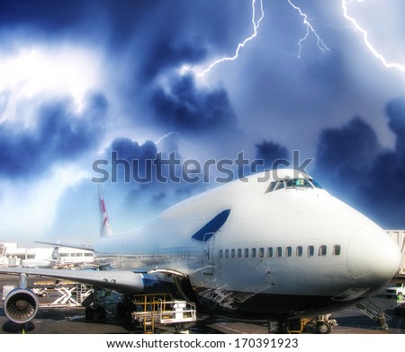 Passenger airplane ready to go. Airport view during a storm.