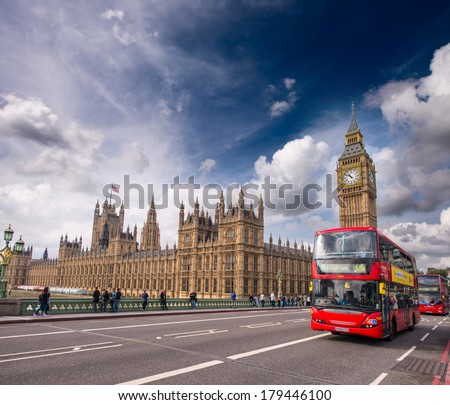London. Classic Red Double Decker Buses on Westminster Bridge.