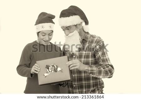 Father and son surprised by Christmas gift. Isolated on white.