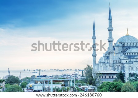 Istanbul. Beautiful view of Blue Mosque and city port with ships awaiting on the sea.