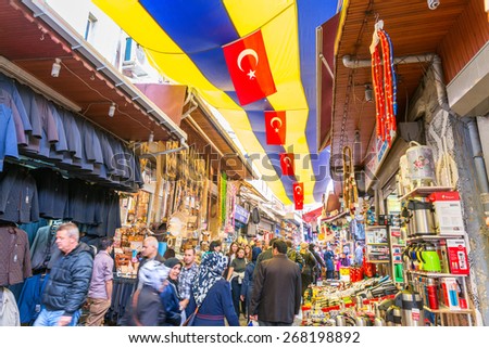 ISTANBUL, SEP 22: People shopping in the Grand Bazar in Istanbul, Turkey, one of the largest covered markets in the world, Istanbul, September 22, 2014.