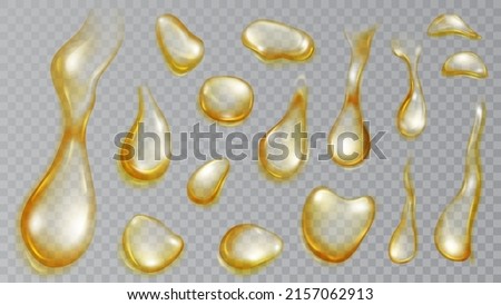 Set of realistic translucent water drops in yellow colors in various shape and size, isolated on transparent background. Transparency only in vector format