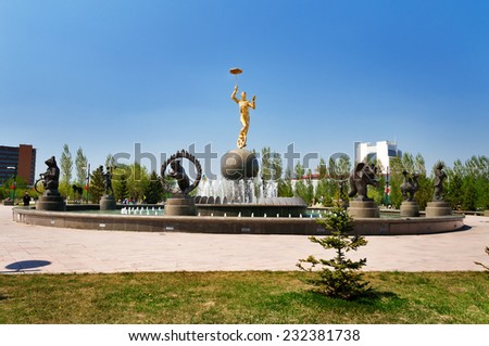 ASTANA, KAZAKHSTAN - MAY 10, 2014: Fountain near the circus in Astana. Circus was built in late 2005. The auditorium seats 2,000 people.