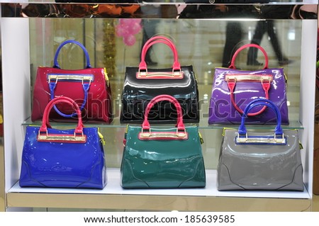 TANGSHAN - NOVEMBER 18: Ms color bag were put on the shelf in a store, on November 18, 2013, tangshan city, hebei province, China.
