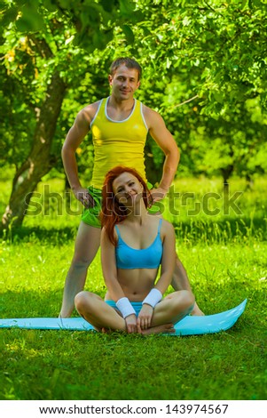 sports girl and man on nature
