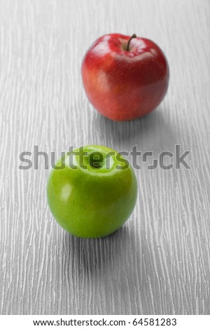 two apples on abstract background