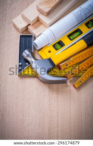 Composition of construction working tools on wooden board building and architecture concept.