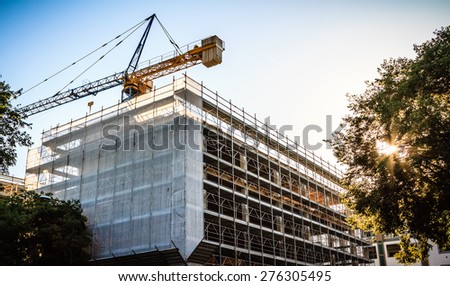 Crane over a commercial and residential building