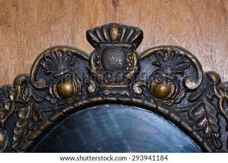 A fragment of an ancient bronze mirror