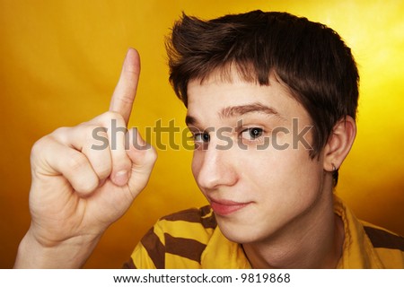 yellow background man finger