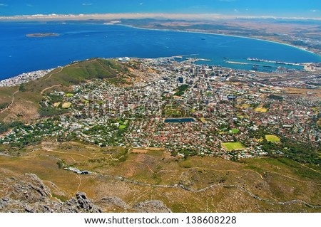aerial view of city of Cape Town as seen from table mountain with table bay and harbor and Green Point Stadium built for the FIFA 2010 world cup soccer