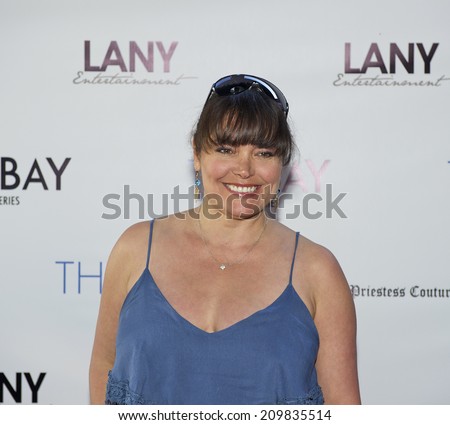 LOS ANGELES/CALIFORNIA - AUGUST 4, 2014: Actress Devin DeVasquez walks the red carpet at \
