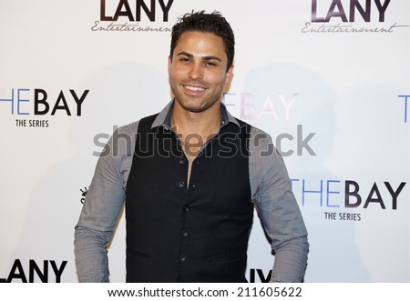 LOS ANGELES/CALIFORNIA - AUGUST 4, 2014: Actor Carlo Mendez walks the red carpet at \
