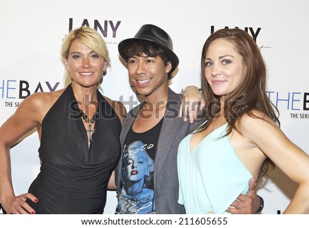 LOS ANGELES/CALIFORNIA - AUGUST 4, 2014: Tina Gianni, Guest & Jade Harlow walk the red carpet at \