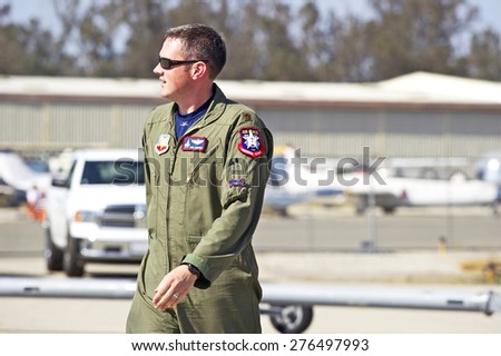 CHINO/CALIFORNIA - MAY 3, 2015: Captain John Cummings F-22 Raptor Demo Pilot as he disembarks and approaches onlookers at the Planes of Fame Airshow in Chino, California USA