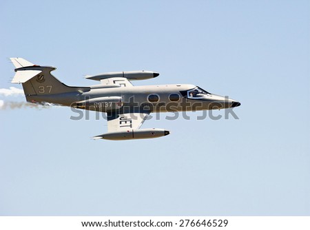 CHINO/CALIFORNIA - MAY 3, 2015: Special Ops Military Lear Jet displaying flying tactics at the Planes of Fame Airshow in Chino, California USA