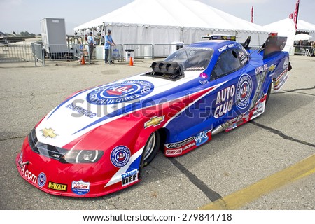 CHINO/CALIFORNIA - MAY 3, 2015: Auto Club of Southern California Chevrolet Camaro SS Funny Car (Robert Hight) on display at the Planes of Fame Air show in Chino, California, USA