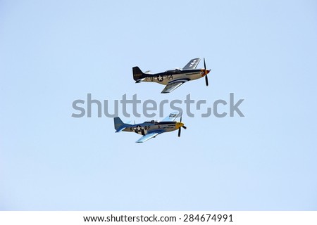 CHINO/CALIFORNIA - MAY 3, 2015: Vintage military aircraft flying in formation at the Planes of Fame Airshow in Chino, California USA