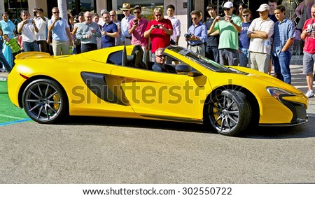 BEVERLY HILLS, CALIFORNIA - JUNE 21, 2015: 2015 McLaren sports car as it leaves the Rodeo Drive Concours D\' Elegance on June 21, 2015 Beverly Hills, California, USA