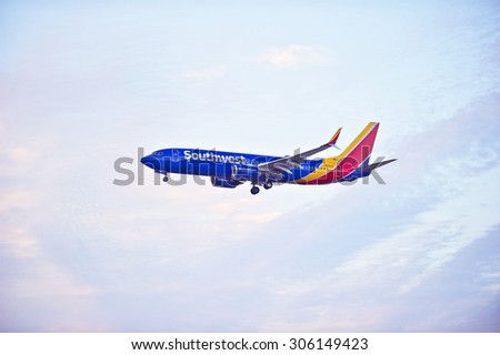LOS ANGELES/CALIFORNIA - AUG. 6, 2015: Southwest Airlines Boeing 738 commercial jet approaches runway for a landing at Los Angeles International Airport in Los Angeles, California, USA