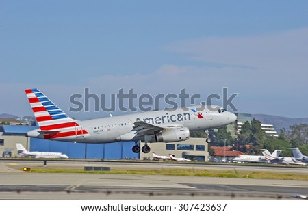 SANTA ANA/CALIFORNIA - AUG. 17, 2015: American Airlines Airbus 319-132 commercial jet departs from John Wayne International Airport in Santa Ana, California, USA