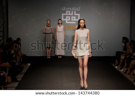 Bangkok - April 17: A Model walks the runway at Divulge : The final collection of the graduates show from the Fashion Department of Decorative Arts, Silpakorn University on Apirl 17,2013 in Bangkok
