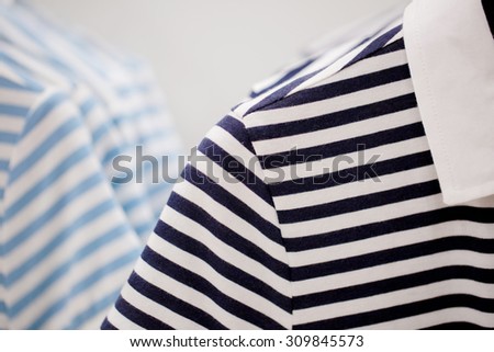 Hanging polo shirt in shopping mall