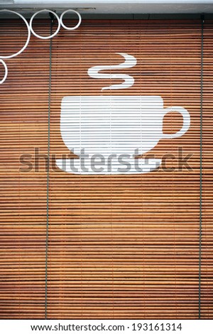 Coffee logo on bamboo curtain