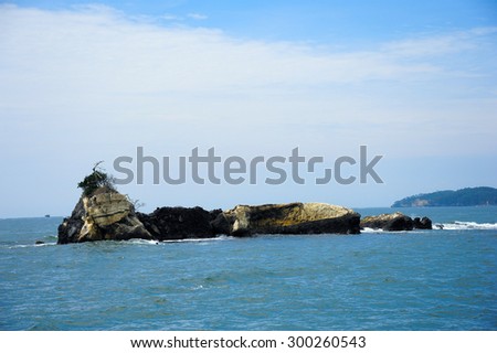 Spectacular coastline in Matsushima, traditionally regarded as one of the three best sights in Japan, beautifully shaped rocks covered with pines.