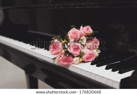Beautiful vintage bouquet of flowers on the piano