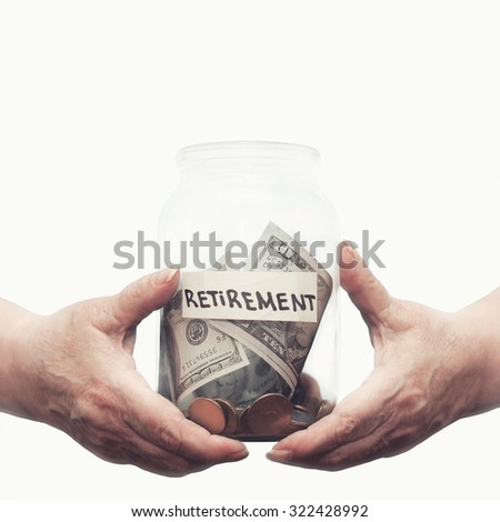 Elderly hands holding glass jar with money on a pension closeup