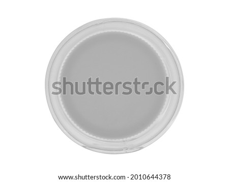 Plastic transparent jar, closed with a lid. Isolated on a white background, close - up view from above Foto d'archivio © 