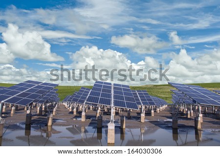 Under the blue sky white clouds, the use of renewable solar power plants, environmental protection