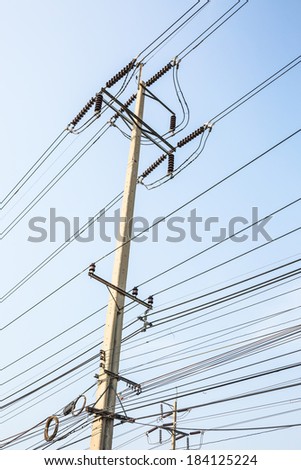 Utility poles with the clear blue sky